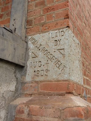 The cornerstone laid by Roosevelt in 1909